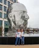 Alison and Steve with the Big Head  Metalmorphosis is a mirrored water fountain by Czech sculptor David Černý that was constructed at the Whitehall Technology Park in Charlotte, NC. The 14-ton sculpture is made from massive stainless steel layers that rotate 360 degrees and occasionally align to create a massive head. It even has it’s own live webcam.   3701 Arco Corporate Dr Charlotte, NC 28273 : Alison, Big Head, Charlotte, Metalmorphosis, Sirna Reunion Board, Steve