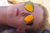 Concentric Relection  St. Augustine Vilano Beach scene with Alison in sunglasses reflecting the beach umbrealla. : Alison, Florida, Sirna Reunion Board, St. Augustine, Vilano Beach, beach, sunglasses